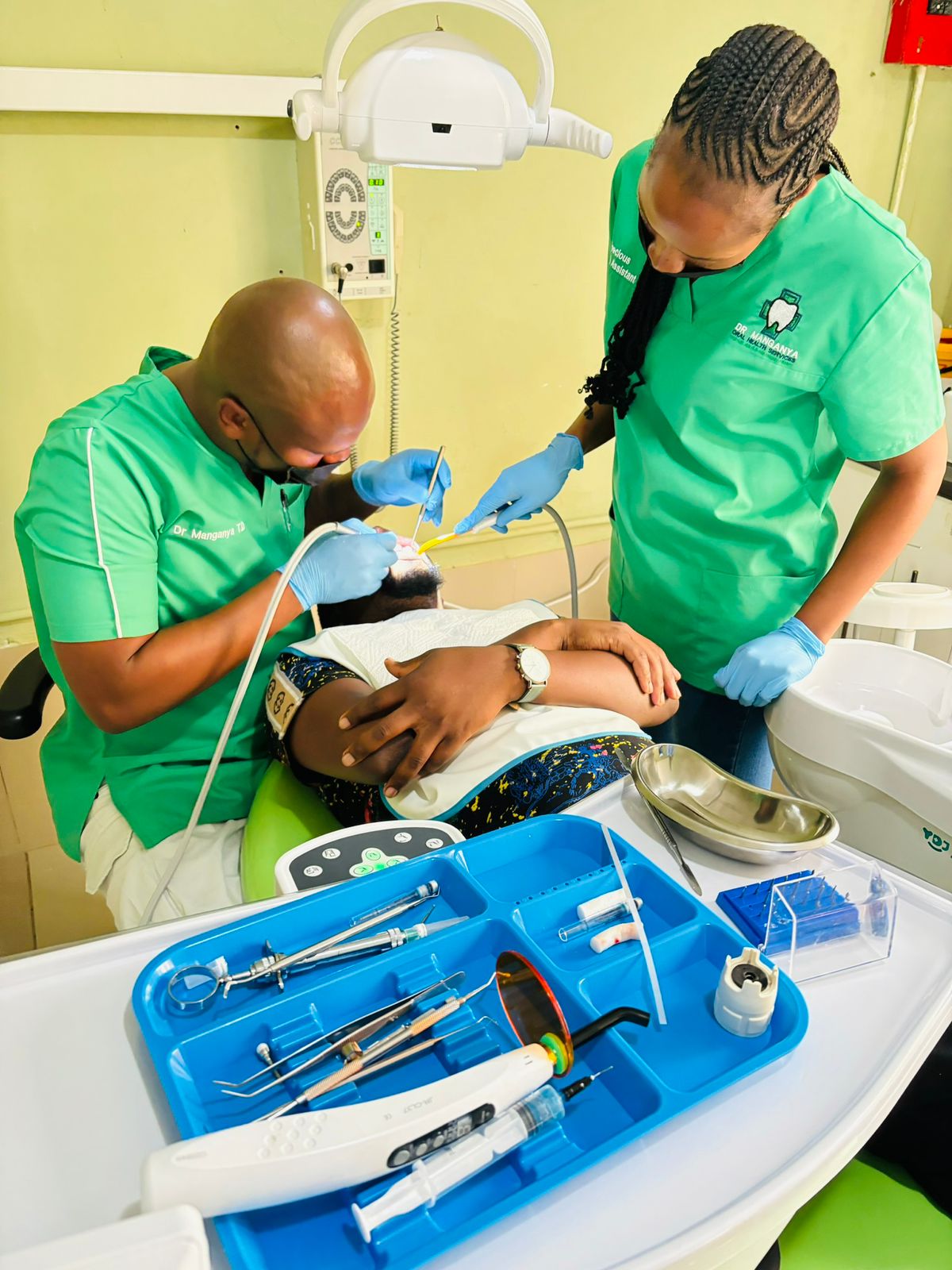 Dr. Manganya with patient